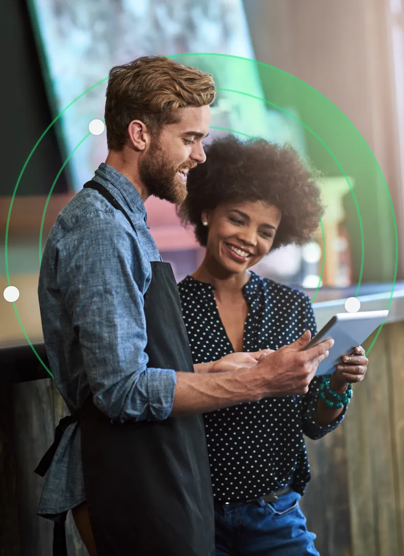 Two employees exploring their EAP and workplace wellbeing services