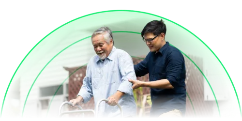 Male carer supporting elderly gentleman, a role suited to the Applicant Suitability Matrix